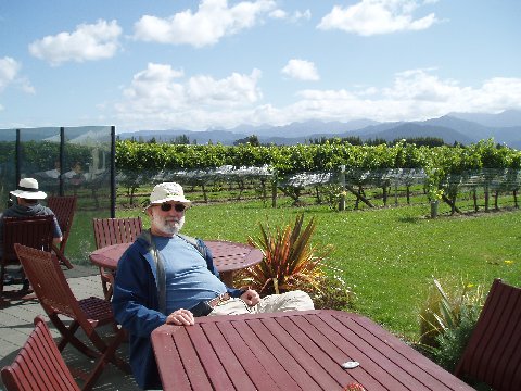(John, doing what he does best, waiting for pastry to arrive, at Michel Something-or-Other winery)