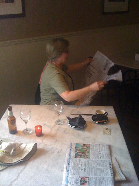 Brenda reading the remnants of my fire act